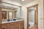 Guest Bath with Dual Vanities, Tub and Glass Shower